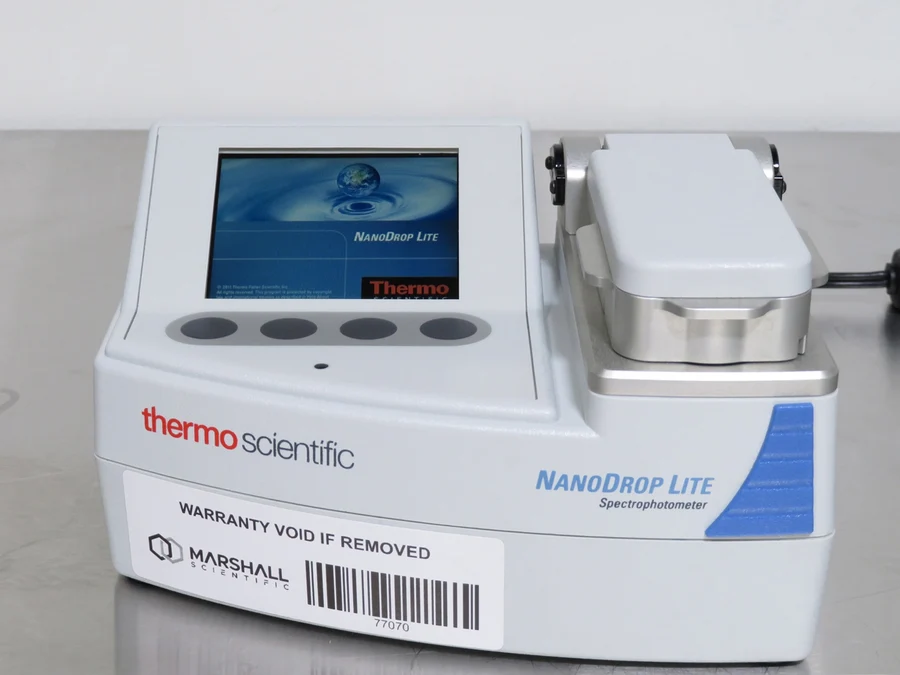 A supplied NanoDrop Lite spectrophotometer photograph illustrating optical measurement instrumentation.